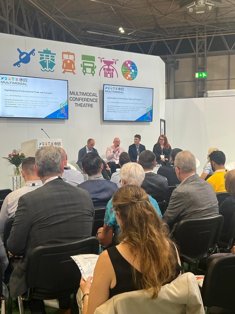 Wide shot of the Multimodal Conference Theatre during the Digitalisation of International Trade and Transport panel.